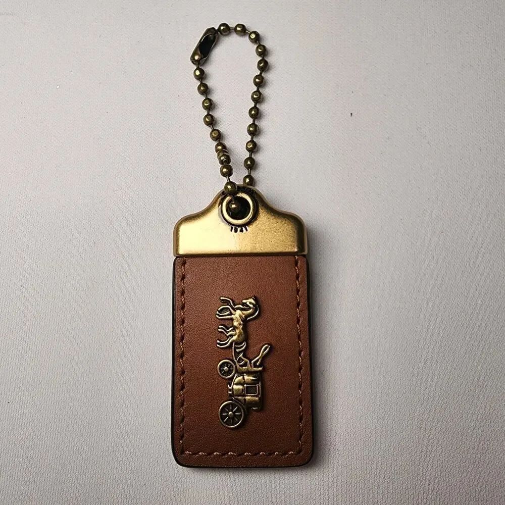 Coach 1941 Horse Carriage Hang Tag Bag Charm - Brass Saddle Multi